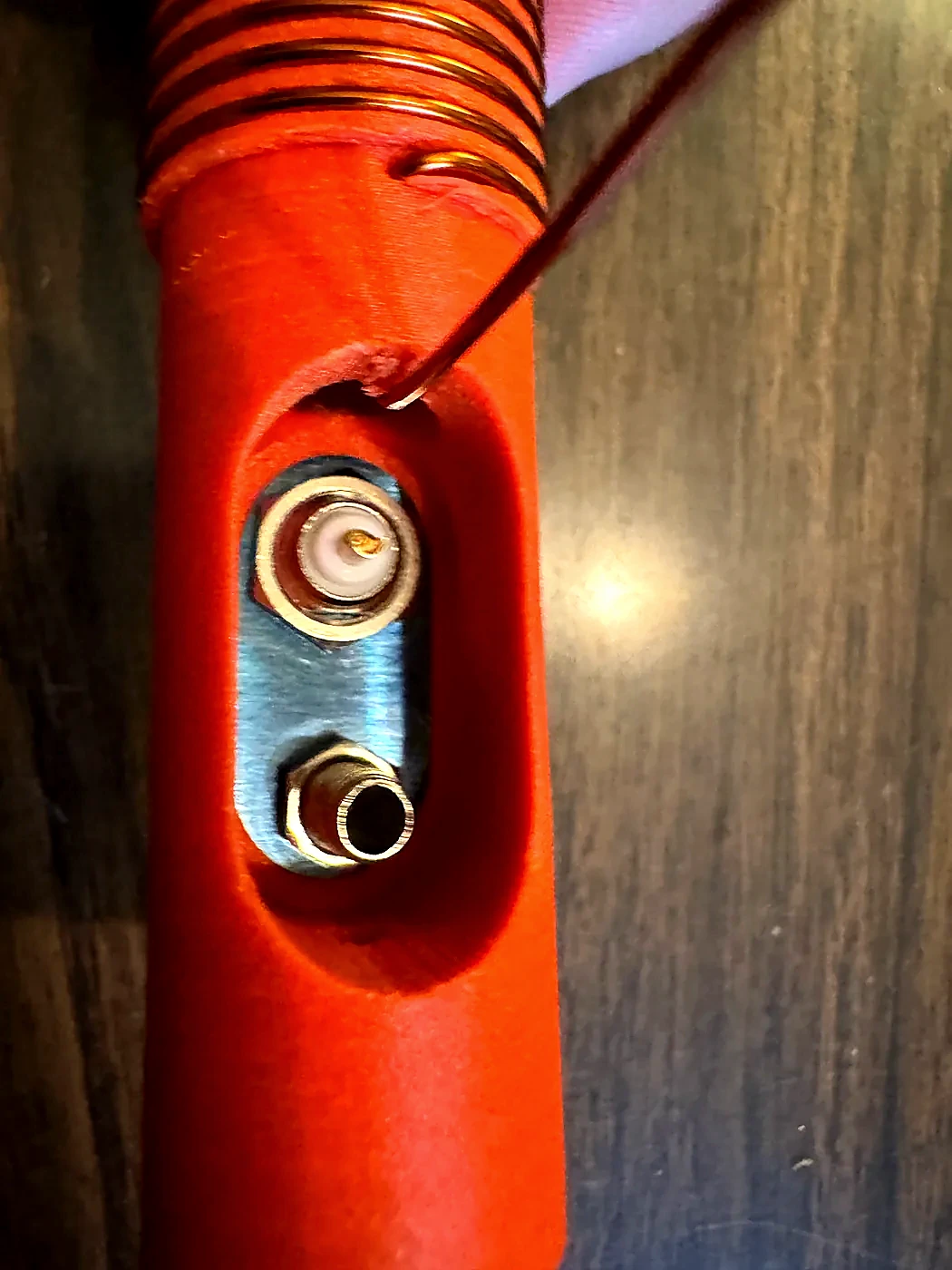 Ground plate and connector hardware visible inside the Hamdo access opening